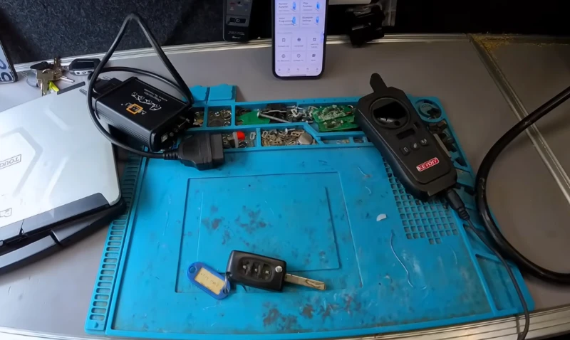 Las Vegas locksmith extracting a broken key from a car door